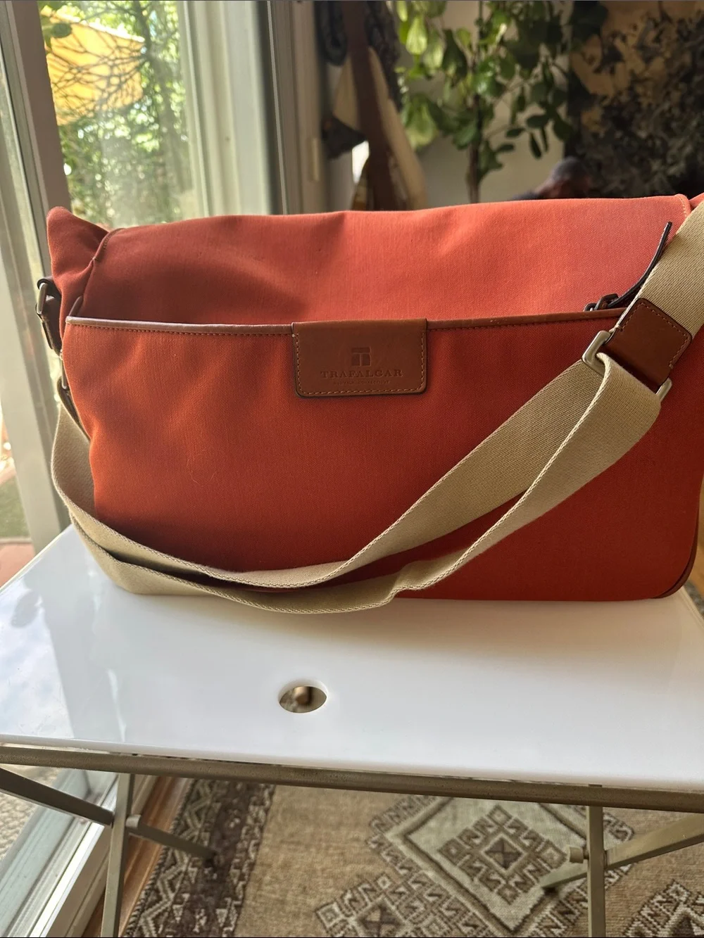 Trafalgar men’s messenger bag burnt orange with leather trim! Live New